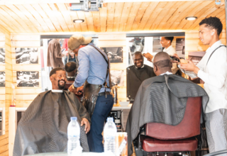 Participants and community members received free haircuts from Tatekulu Barbershop after the conclusion of the #BeFree Babershop