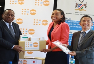 Health minister Hon. Dr Kalumbi Shangula receiving the donation for reproductive health commodities from UNFPA Namibia Officer i