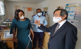 The Japanese Ambassador to Namibia H.E. Hideaki Harada with Executive Director of NAPPA, Frieda Stefanus and a health worker at the facility.