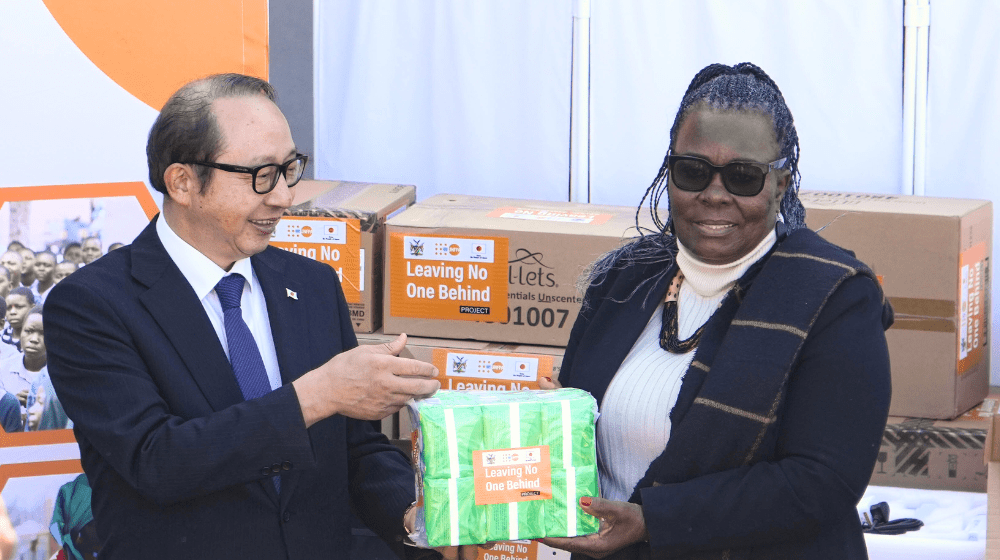 Minister of Education, Arts, and Culture Hon. Anna Nghipondoka receives the donation from Japan's Ambassador to Namibia, H.E. Mr. Hisao Nishimaki.