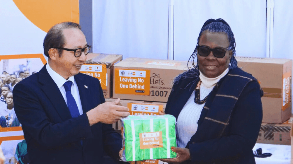 Minister of Education, Arts, and Culture Hon. Anna Nghipondoka receives the donation from Japan's Ambassador to Namibia, H.E. Mr. Hisao Nishimaki.