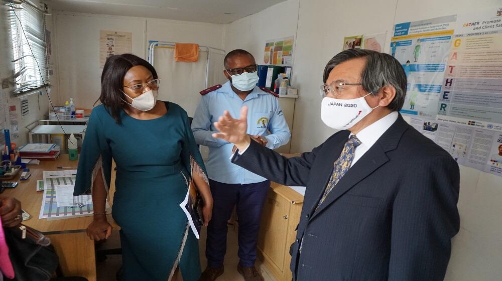 The Japanese Ambassador to Namibia H.E. Hideaki Harada with Executive Director of NAPPA, Frieda Stefanus and a health worker at the facility.